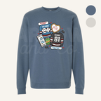 Blue sweatshirt with hockey sports-themed graphics on a white background
